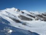 Vista da discesa Tre Potenze su pista Passo Annibale e albergone